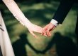 man and woman holding hands focus photo